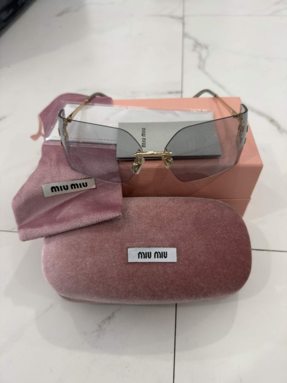 MIU MIU SMU54Y Women’s Sunglasses